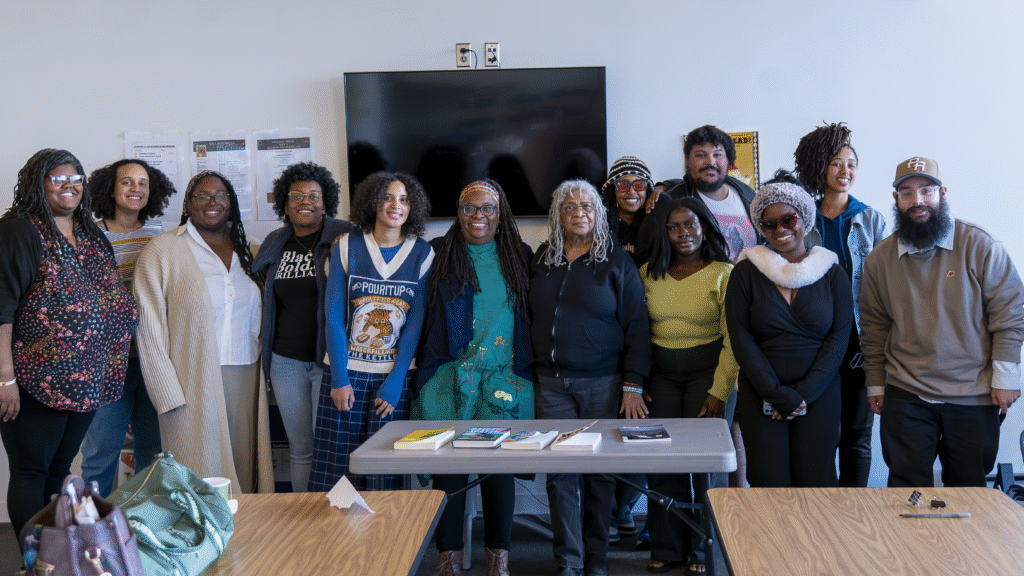 Group Photo featuring Go Back and Fetch It cohort indoors with Sherrie Fernandez-Williams