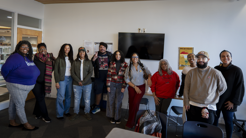 Group Photo featuring Go Back and Fetch It cohort indoors with Tish Jones