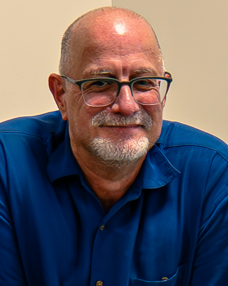 a headshot of John Medeiros